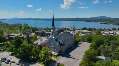 Saint Patrice Church aerial view at 115 Rue Merry N in historic downtown of Magog, Memphremagog County, Quebec QC, Canada. 