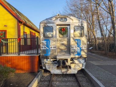 Bedford Depot and Budd Rail Diesel Car RDC #6621 on Loomis Street in historic town center of Bedford, Massachusetts MA, USA. 