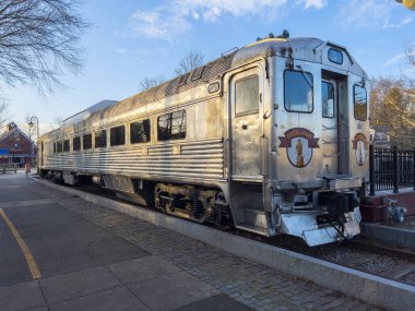 Bedford Depot and Budd Rail Diesel Car RDC #6621 on Loomis Street in historic town center of Bedford, Massachusetts MA, USA. 