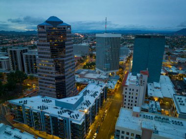 Tucson modern skyscrapers at sunset including One South Church, Bank of America Plaza and Pima County Legal Services Building on Stone Avenue in downtown Tucson, Arizona AZ, USA. 