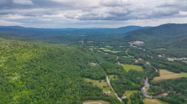 Stinson Mountain, Tenney Mountain and Baker River valley between them from top of Rumney historic center aerial view in summer in White Mountain National forest, Rumney, New Hampshire NH, USA. 