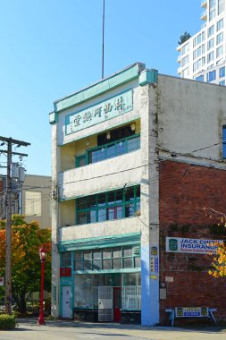 Historic commercial buildings on E Pender Street in historic Chinatown in city of Vancouver, British Columbia BC, Canada. 