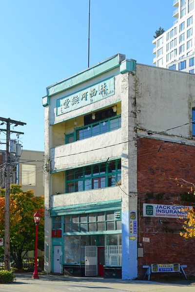 Historic commercial buildings on E Pender Street in historic Chinatown in city of Vancouver, British Columbia BC, Canada. 