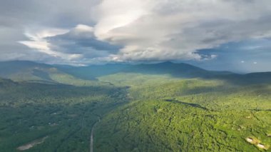 Flying over the Campton Mountain in summer with White Mountain National Forest at the background in town of Campton, New Hampshire NH, USA. 