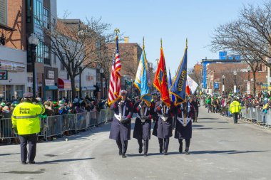Military March in Saint Patrick's Day Parade in Boston, Massachusetts MA, USA.