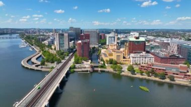 Cambridge Kendall Square skyline and Longfellow Bridge aerial view, Boston, Massachusetts MA, USA. The bridge connects Cambridge and Boston over Charles River is a steel rib arch bridge built in 1906.