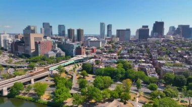Boston modern city skyline including West End, Financial District, Beacon Hill and Back Bay, with Longfellow Bridge cross over Charles River in Boston, Massachusetts MA, USA. 