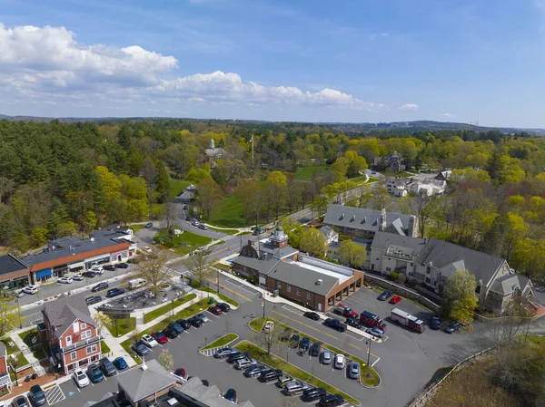 stock image Weston historic town center aerial view in spring including Town Hall, Lanson Park, Fire Station and St Julia's Catholic Church on Boston Post Road, Weston, Massachusetts MA, USA. 