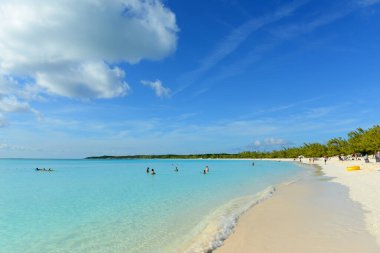 Half Moon Beach on Half Moon Cay. This island is also called Little San Salvador Island located in the Bahamas.  clipart