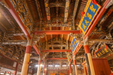 Interior of Dacheng Hall of Quanzhou Confucian Temple in Licheng District in historic city center of Quanzhou, Fujian, China. Confucian Temple a World Heritage Site. clipart