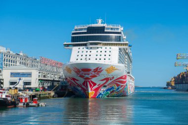 Norwegian Joy by Norwegian Cruise Line docked at Boston Cruise Port in Seaport District, city of Boston, Massachusetts MA, USA.  clipart