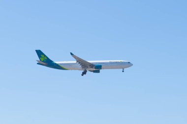 Aer Lingus Airbus 330-300 EI-EIK landing on Boston Logan International Airport, Boston, Massachusetts MA, USA.  clipart