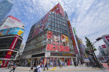 Commercial building with Fist of the North Star post on Yasukuni dori Avenue (Route 302) at Shinjukuogado E in Kabukicho, Shinjuku City, Tokyo, Japan.  clipart