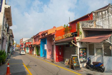 Historic commercial buildings on Lorong Hang Jebat Street in city center of Melaka, Malaysia. Historic cities of the Strait of Malacca is a World Heritage Site.  clipart