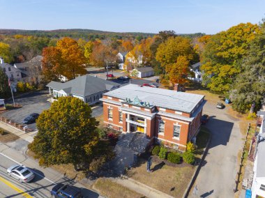 Simon Fairfield Public Library aerial view in fall with fall foliage at 290 Main Street in East Douglas village, town of Douglas, Massachusetts MA, USA.  clipart