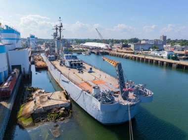 USS Salem CA-139 heavy cruiser aerial view at Weymouth Fore River in Quincy, Massachusetts MA, USA. The ship was built in 1949 and retired in 1959. clipart