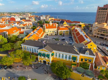 Willemstad historic city center aerial view including Fort Amsterdam in Punda in city of Willemstad, Curacao. Historic Willemstad is a UNESCO World Heritage Site.  clipart