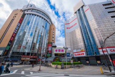 Sennichimae Street with Japanese style shops and restaurants near Dotonbori Street in Nipponbashi, Namba District, Chuo ward, city of Osaka, Japan.  clipart