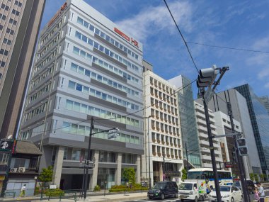 Modern skyscrapers on Meiji dori Avenue in Sendagaya 5 Chome, Shibuya City, Tokyo, Japan.  clipart