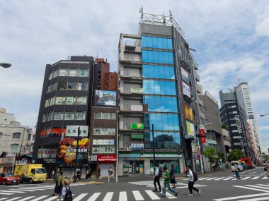 Modern commercial buildings at Yoyogi Square near Yoyogi JR Station, Shibuya City, Tokyo, Japan.  clipart