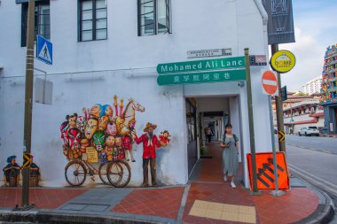 Fresco on the wall in Mohamed Ali Lane at South Bridge Road in Chinatown, Outram district of Central Area, Singapore. clipart