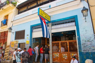 La Bodeguita del Medio on Calle Empedrado St at Calle San Ignacio Street in Old Havana, Cuba. Old Havana is a World Heritage Site. This bar was Ernest Hemmingway's favorite in Havana.  clipart