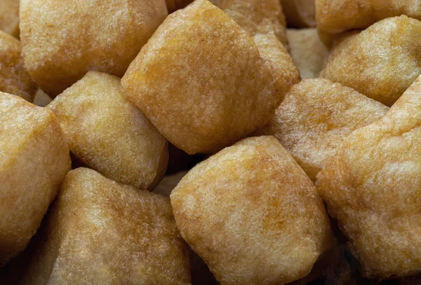 stock image Close up of Brown fried tofu puffs or Deep Fried Tofu. Healthy asian food, Space for text.