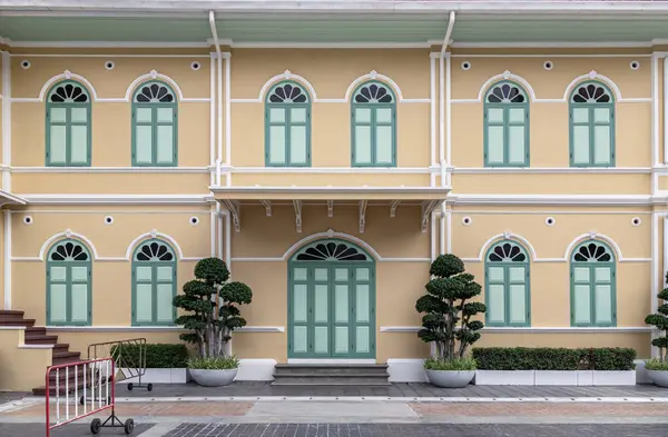 stock image Bangkok, Thailand - May 22, 2024 - Colonial architectural style in front of Pum Tain Pra Sit Building. Archaeological site, Space for text, Selective focus.