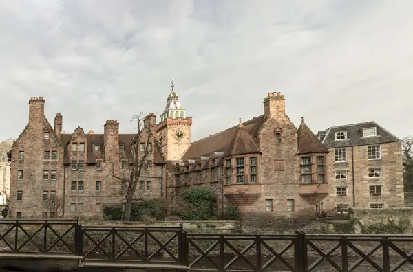 stock image Edinburgh, Scotland - Jan 16, 2024 - Well Court is a traditional old Tenement building in Dean Village which sits along the banks of the Water of Leith. Space for text, Selective focus.