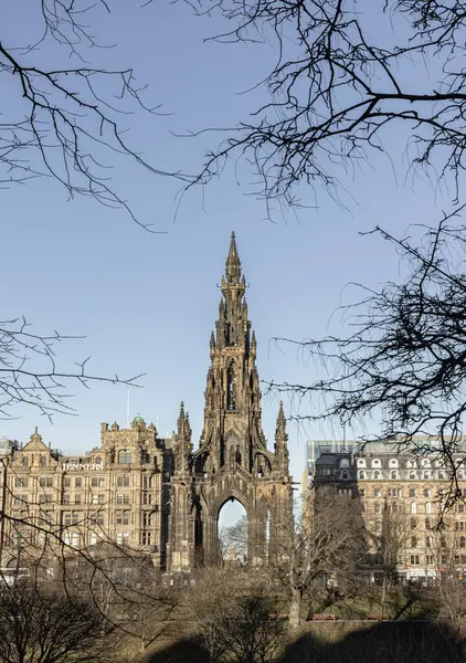 stock image Edinburgh, Scotland - Jan 16, 2024 - A view of The Scott Monument is a Victorian Gothic monument to Scottish author Sir Walter Scott. It is the largest monument to a writer in Princes Street Gardens at the city of Edinburgh. Copy space, Selective foc