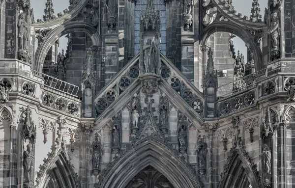 stock image Edinburgh, Scotland - Jan 16, 2024 - The architectural details of The Scott Monument and spire is a Victorian Gothic monument to Sir Walter Scott. It is the largest monument to a writer in Princes Street Gardens at the city of Edinburgh. Space for te