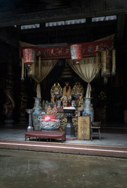 Bangkok, Thailand - Apr 29, 2022 - Chinese god statues on Chinese altar table at Phutthamonthon sathan or Sun wukong shrine. Space for text, Selective focus. clipart