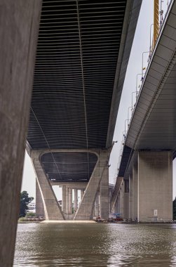 Bangkok, Thailand - 17 Nov, 2024 - Architecture infrastructure of Chalerm Maha Nakhon Expressway (Foundation pillar abutment which is V-shaped) and Saphan Phra Ram Kao (Rama IX Bridge) which is a bridge across the Chao Phraya River. Exterior Design A clipart