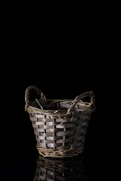 Small Wicker Basket Black Background — стоковое фото