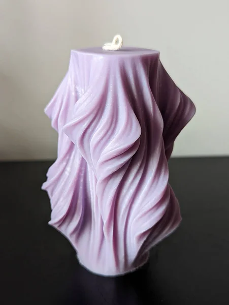Handmade Ecological Vegan Soy Wax Candle Shape Purple Wave Royalty Free Stock Images