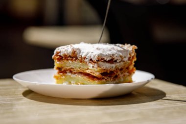 The slice of puff pastry custard cake