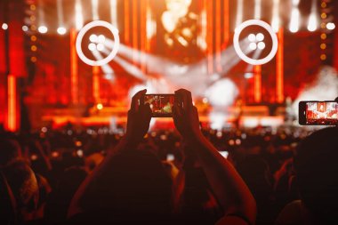 Streaming from the dance floor via mobile phone. Concert show