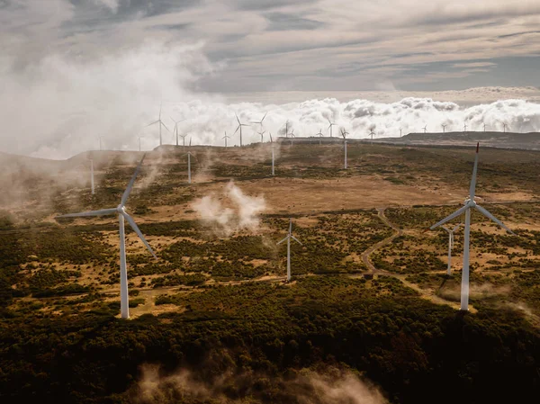 stock image Windmills farm - wind generator turbines - on the top of a mountain