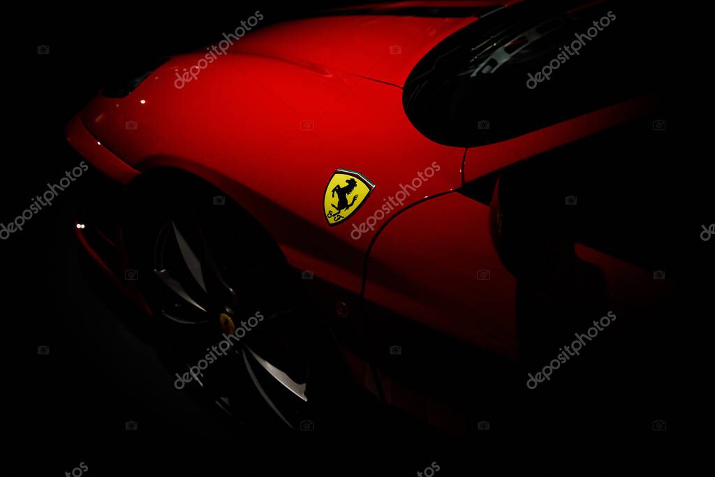 Maranello, Italy - April 01, 2023: Ferrari logo on the red luxury car