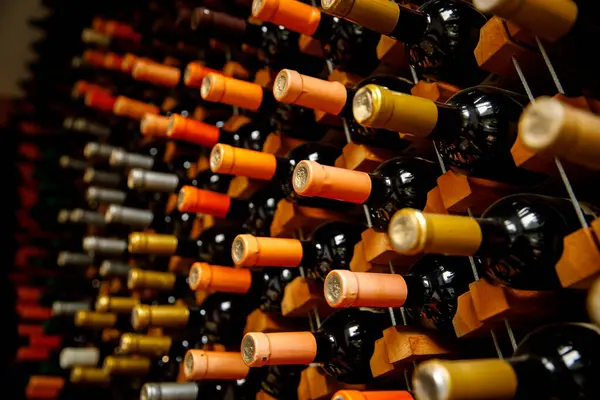Collection of wine bottles - bottle necks with corks close-up