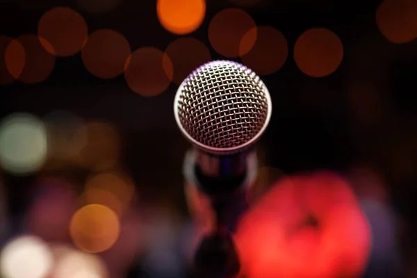 Close-up of microphone in concert hall or stand up club