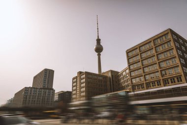 Neighborhoods of East Berlin with a TV tower in the center clipart