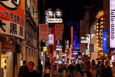 TOKYO, JAPAN - October, 22, 2024: Tokyo streets at night clipart