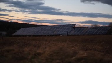 solar panels on the territory of a private house in the mountains against the sky