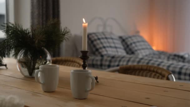 Two Cups Hot Tea Wooden Table Close Background Candle Christmas — Vídeo de Stock