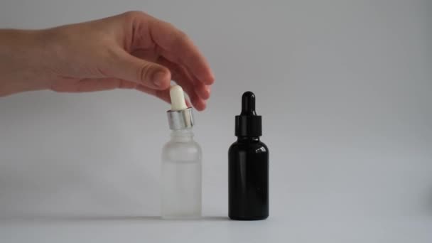 Woman Hand Takes Out Pipette Cosmetic Face Serum Glass Jar — Stock Video