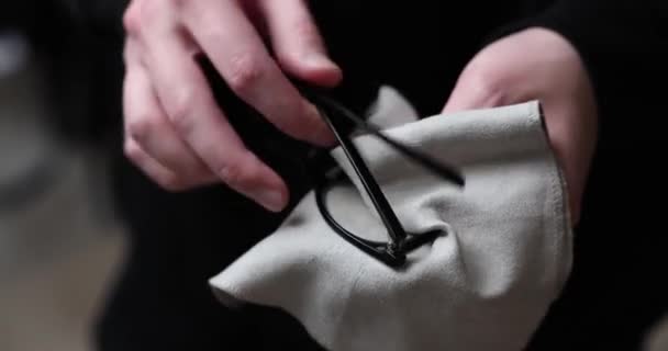 Man Wiping Eyeglasses Soft Cloth Close Hands — Stockvideo