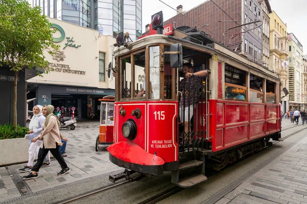 stock image Istanbul, Turkey - August 25 2022: Nostalgic Taksim Tunel Red Tram, or tramvay, at Istiklal Street, Beyoglu district, central Istanbul, in a sunny summer day