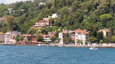 View from the sea of the European side of Bosphorus strait, Istanbul, Turkey, with traditional houses, in a summer day