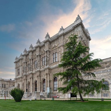 Dolmabahce Palace, or Dolmabahce Sarayi, located in Besiktas district on the European coast of the Bosporus, was the main administrative center of the Ottoman Empire formerly, Istanbul, Turkey clipart